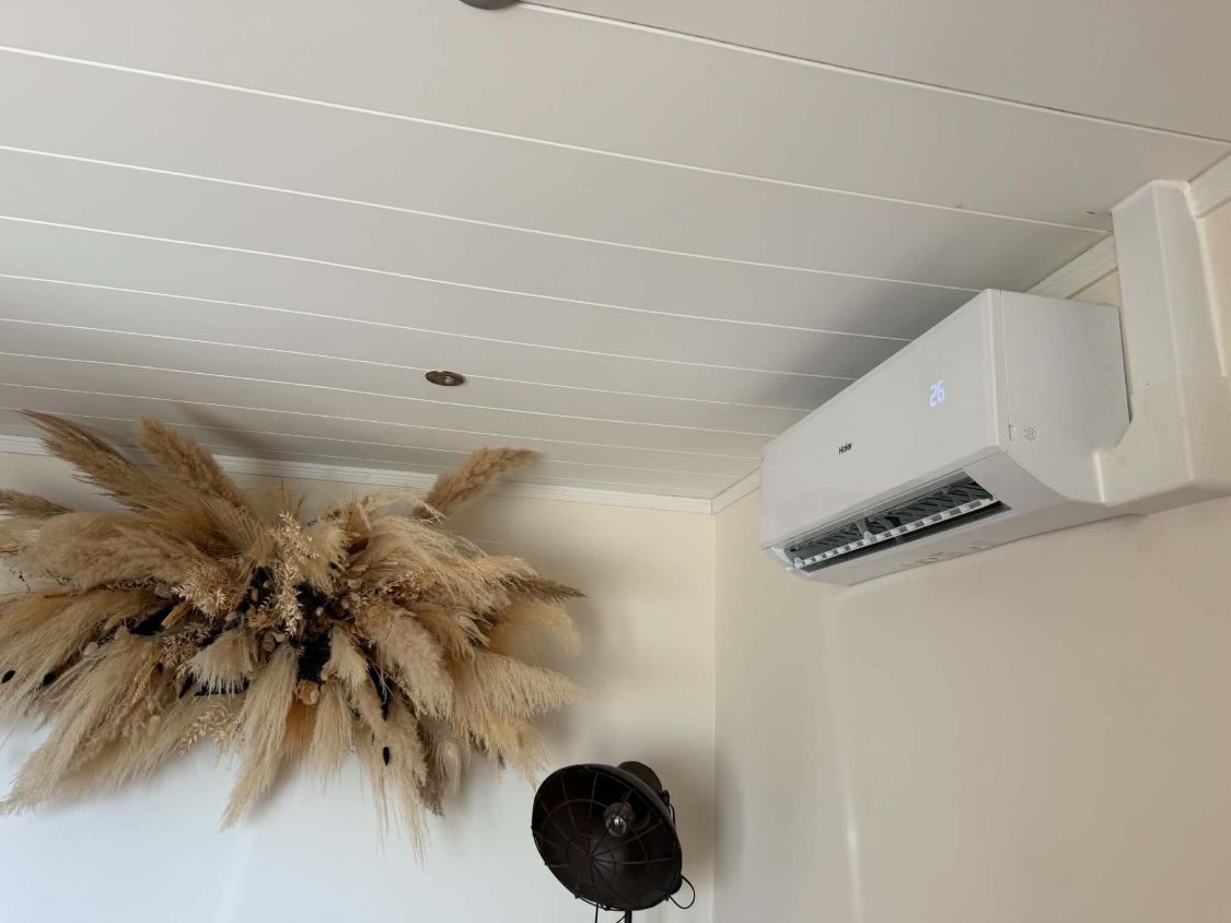Haier wall-mounted air conditioner in a living room